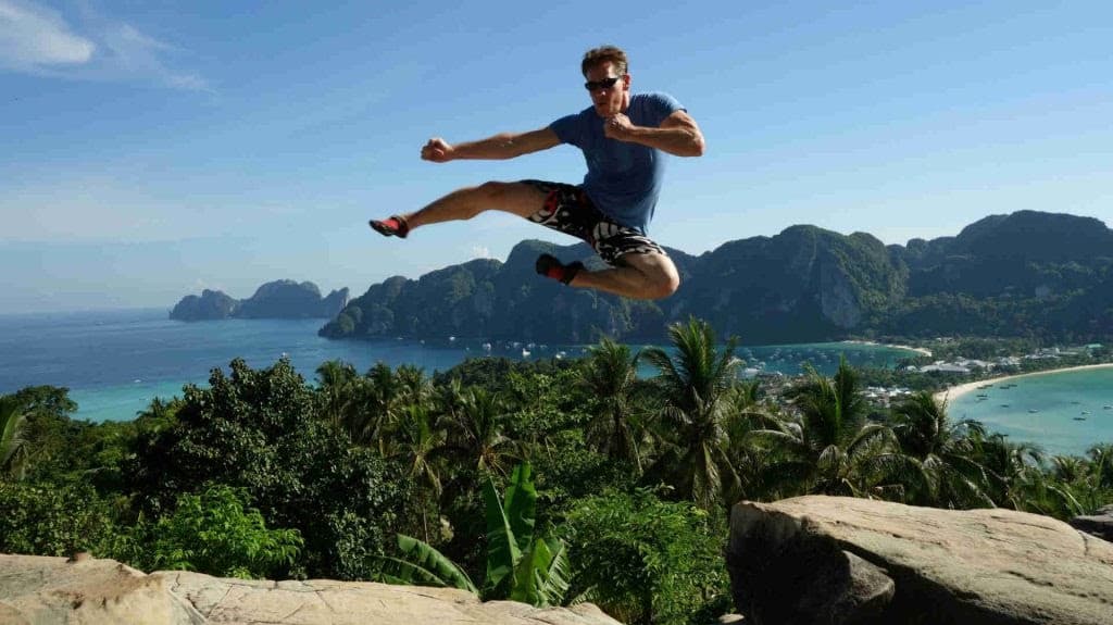 Rick Tew flying kick over Phi Phi island viewpoint