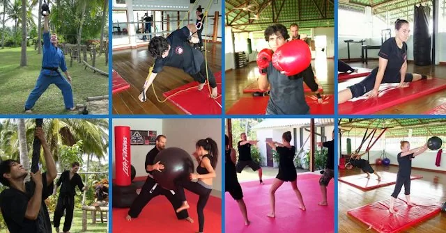Adults, men and women, training on red mats inside NinjaGym on Koh Samui